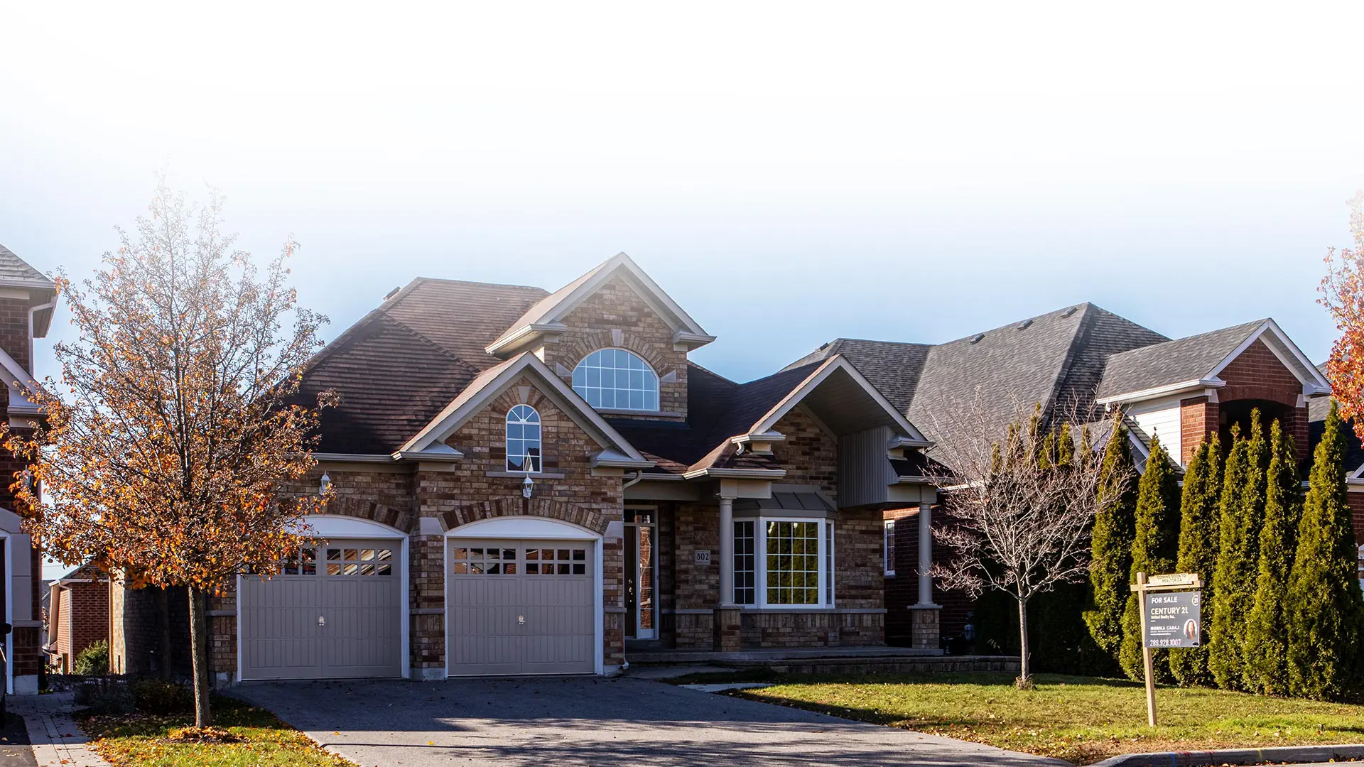 Home in new development, meticulously landscaped, large windows